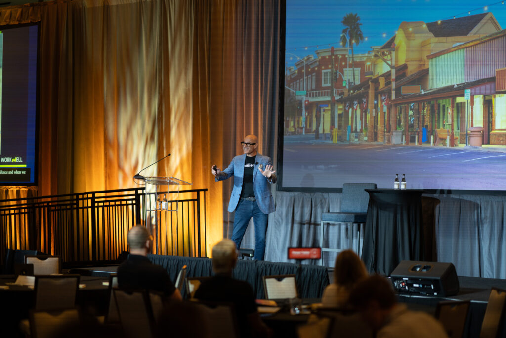 Keynote Adam Markel from WorkWell discussing resilience at DEAMcon25