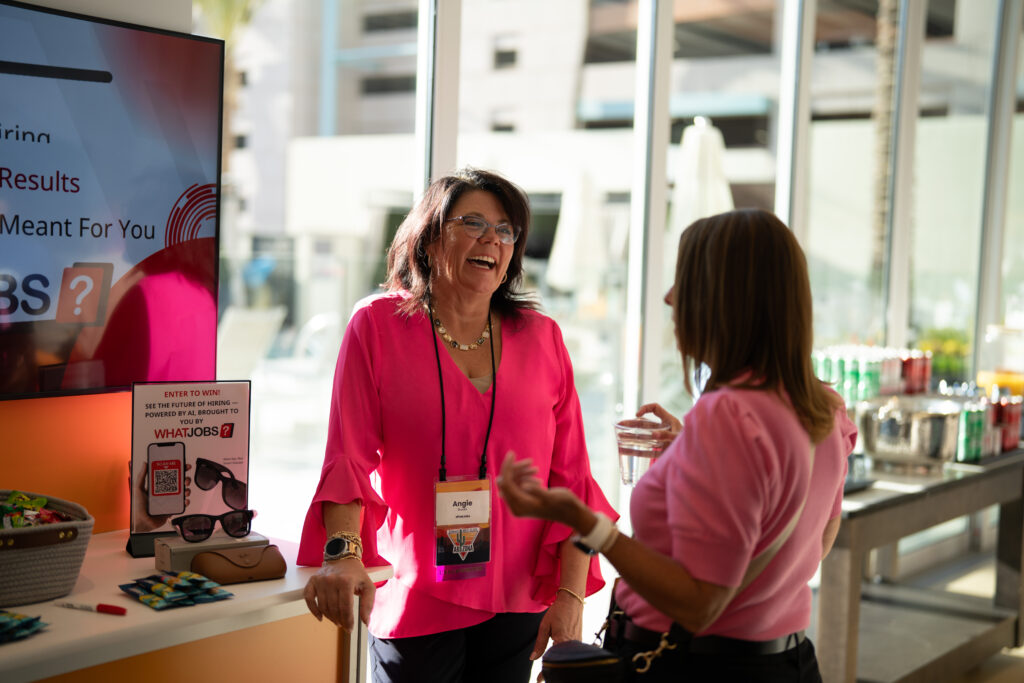 Underwriter WhatJobs? enjoying conversation and connection in the DEAMcon25 Demo Hall