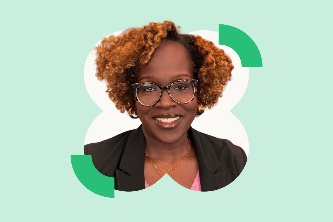 Close-up headshot of Black woman with short curly hair