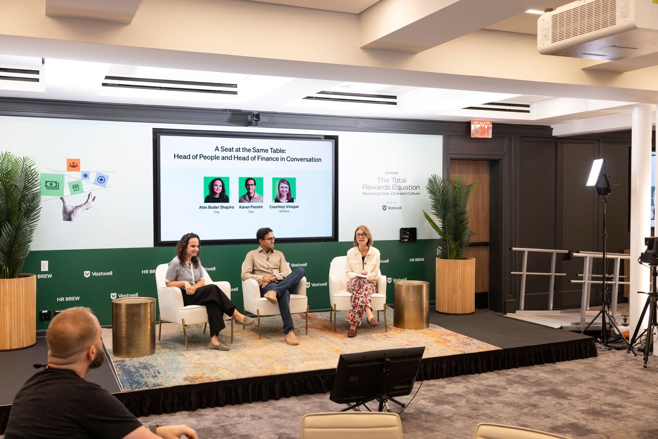 HR Brew's Courtney Vinopal moderates a panel with the people and finance chiefs of Clay.